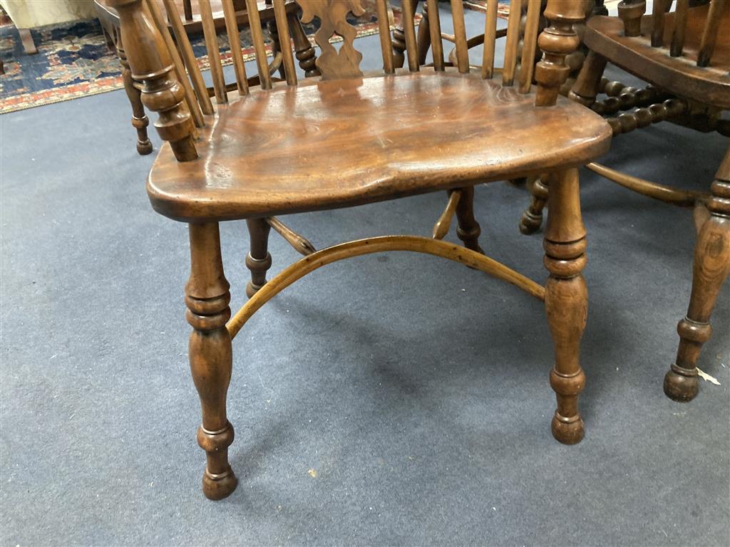 A set of eight 19th century and later Yorkshire area yew, elm and ash Windsor armchairs